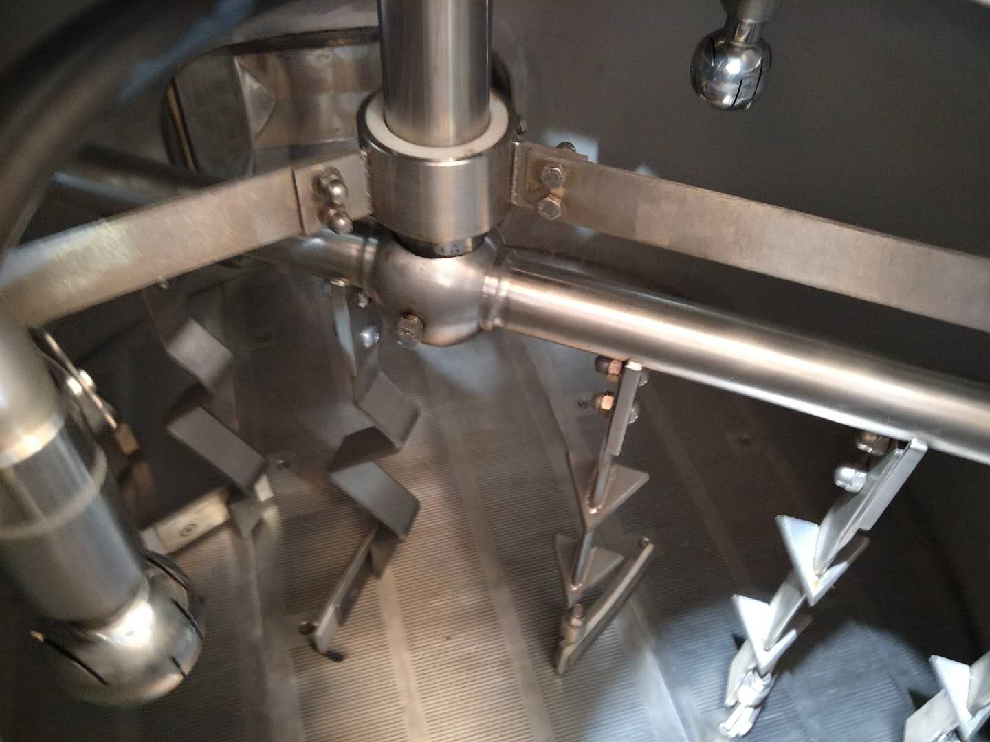 Mash rake and CIP cleaning ball in the mash tank.jpg